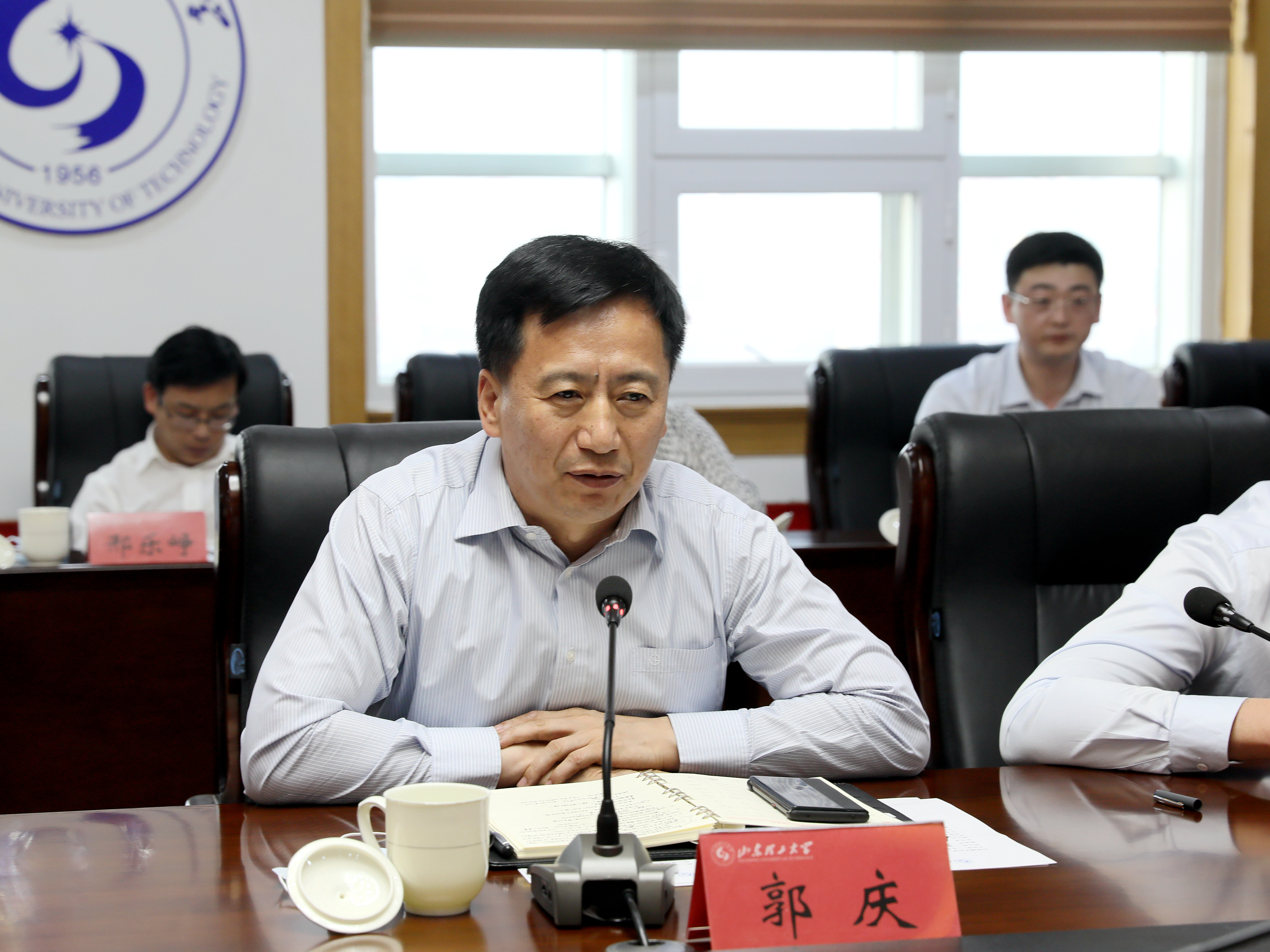 张店区委书记郭庆一行来校调研交流